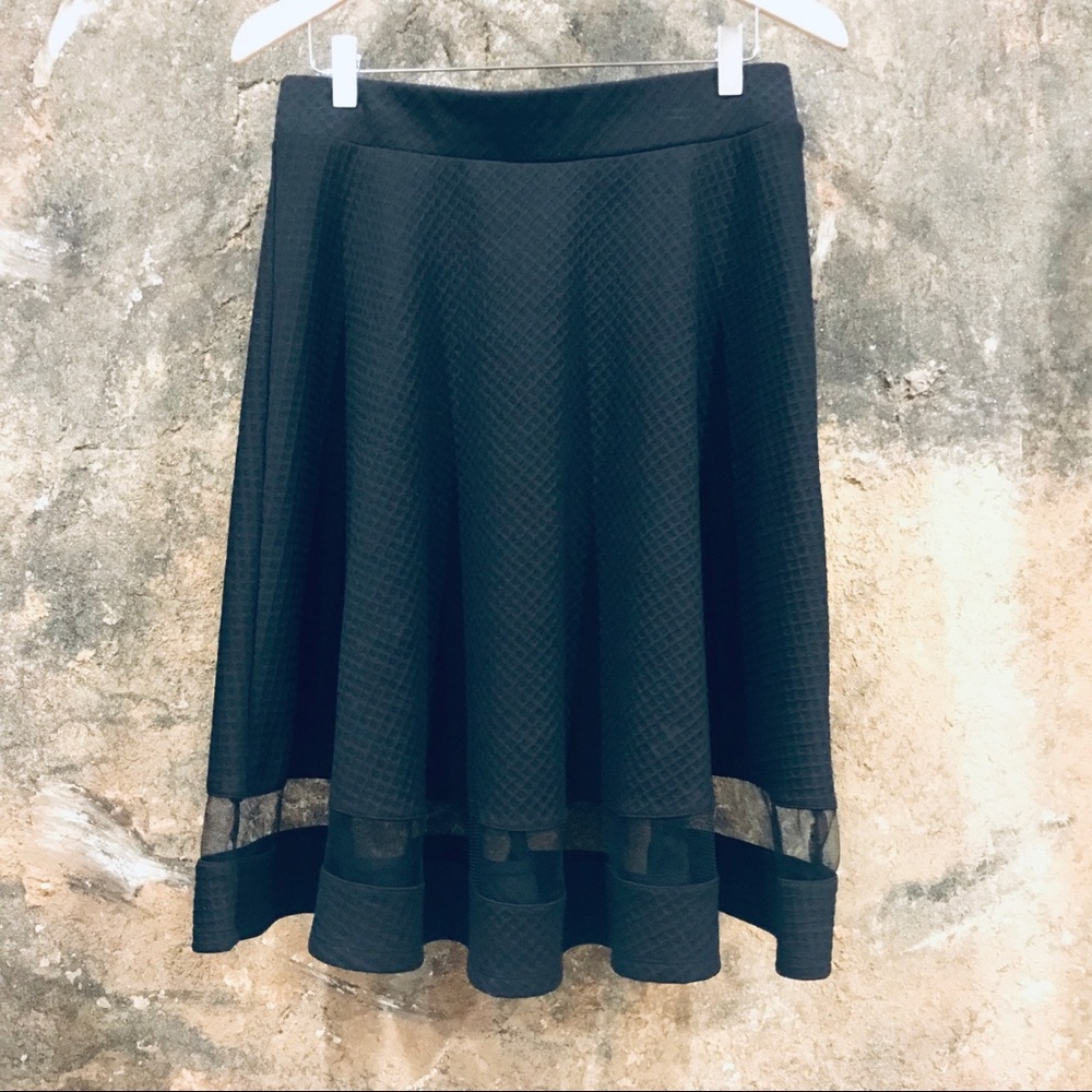 black skirt with diamond weave and mesh panel